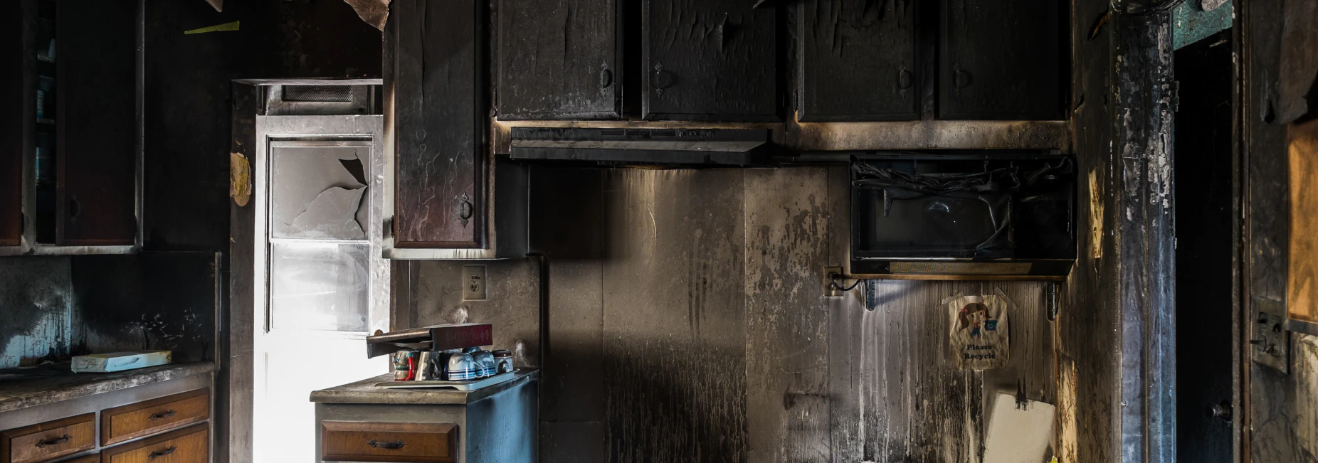 Interior of a home damaged by fire property damage insurance dundalk md